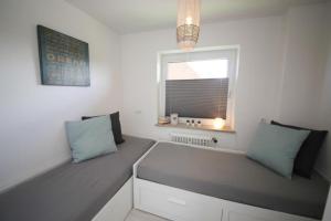 Posezení v ubytování Ferienwohnung Meeresstrand