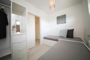 Postel nebo postele na pokoji v ubytování Ferienwohnung Meeresstrand