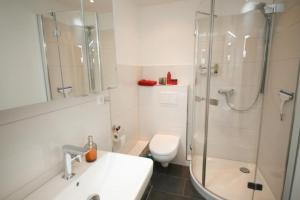 Koupelna v ubytování Ferienwohnung Meeresstrand + 15 fotografií