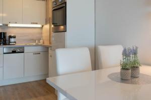 Kuchyň nebo kuchyňský kout v ubytování Ferienwohnung Muschelsucher