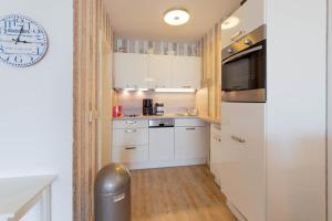 Kuchyň nebo kuchyňský kout v ubytování Ferienwohnung Muschelsucher