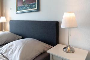 Postel nebo postele na pokoji v ubytování Ferienwohnung Muschelsucher