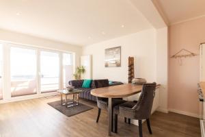 Posezení v ubytování Ferienwohnung Aalkate App 1