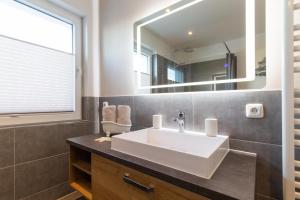 Koupelna v ubytování Ferienwohnung Aalkate App 1 + 15 fotografií