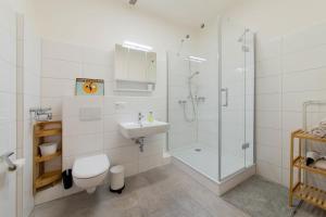 Koupelna v ubytování Ferienwohnung Godewind + 26 fotografií