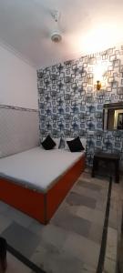 Cama o camas de una habitación en Good Vibes Hotel