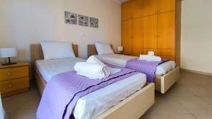 Ένα ή περισσότερα κρεβάτια σε δωμάτιο στο Michaela's apartment in Fanari