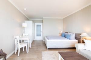 Postel nebo postele na pokoji v ubytování Ferienwohnung Residenz App 149 - Timmendorfer Strand