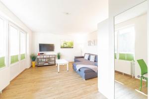 TV a/nebo společenská místnost v ubytování Ferienwohnung Mika