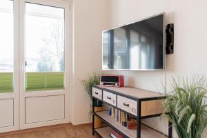 TV a/nebo společenská místnost v ubytování Ferienwohnung Mika