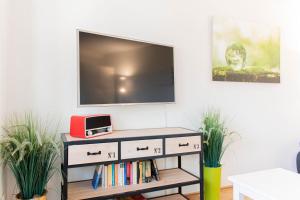 TV a/nebo společenská místnost v ubytování Ferienwohnung Mika