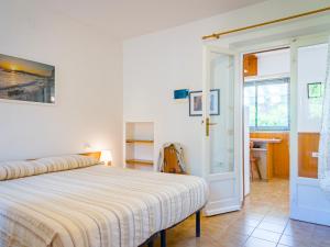 A bed or beds in a room at Residence Augusto