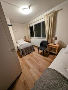 Uma cama ou camas num quarto em The Stykkishólmur Inn by Ourhotels