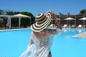 Bazén v ubytování Masseria Corda Di Lana Hotel & Resort nebo v jeho okolí