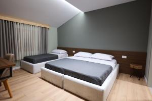 Hotel Ikona客房内的一张或多张床位