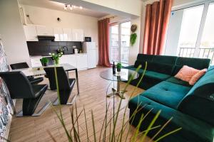 Kuchyňa alebo kuchynka v ubytovaní Apartament The Palm 35 by Housine
