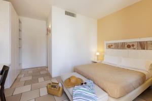 Postel nebo postele na pokoji v ubytování Masseria Corda Di Lana Hotel & Resort