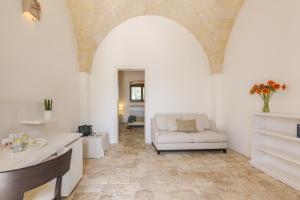 Posezení v ubytování Masseria Corda Di Lana Hotel & Resort