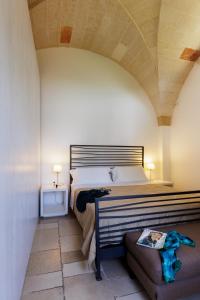 Postel nebo postele na pokoji v ubytování Masseria Corda Di Lana Hotel & Resort