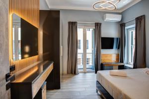 Postel nebo postele na pokoji v ubytování Agora Apartments