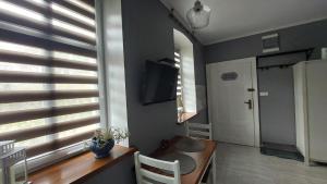 Kuchyňa alebo kuchynka v ubytovaní Apartamenty u Rzepióra