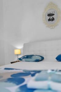 Postel nebo postele na pokoji v ubytování Casa Del Porto - Vis