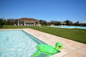 Bazén v ubytování Masseria Corda Di Lana Hotel & Resort nebo v jeho okolí