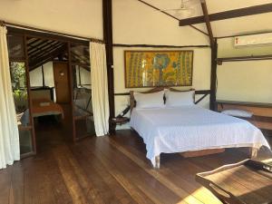 Ένα ή περισσότερα κρεβάτια σε δωμάτιο στο Shanti House +31 φωτογραφίες