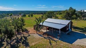 an overhead view of a tiny house in a field at Rockin' R - Morning Star Cabin in Fredericksburg
