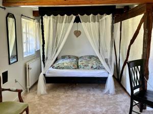 Postel nebo postele na pokoji v ubytování Enghavegaard Guesthouse