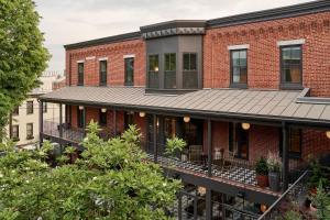 a red brick building with a black roof at Anna and Bel in Philadelphia