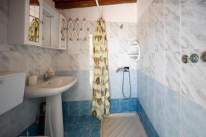 a bathroom with a sink and a shower at Villa Danilo - Sicilia Vacanza in Avola +48 photos