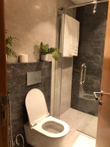 Koupelna v ubytování Luxury 1 BR Apt DAMAC Abdali