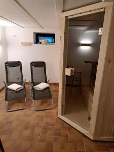Posezení v ubytování Ferienwohnung Jungbär - Die Wohlfühl-Adresse im Stangenwald