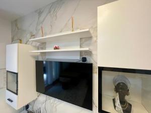 Kuchyň nebo kuchyňský kout v ubytování Apartment Rafailovici