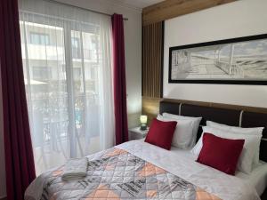 Hotel Halibas客房内的一张或多张床位