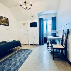 Postel nebo postele na pokoji v ubytování Senate Hotel
