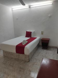 Postel nebo postele na pokoji v ubytování Hotel Margarita