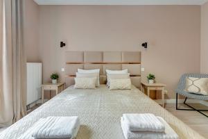 Postel nebo postele na pokoji v ubytování Staywin Aura Gdańsk I