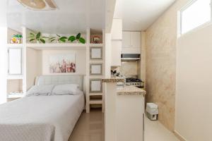 En eller flere senge i et værelse på Studio at the Resort Residence 2 + 29 billeder