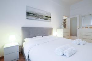 Postel nebo postele na pokoji v ubytování PrimoPiano - Promessi Sposi