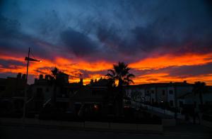 The sunrise or sunset as seen from A villát or nearby