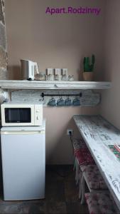 Kuchyňa alebo kuchynka v ubytovaní Apartamenty u Rzepióra