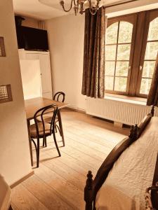 Posezení v ubytování B&B La Source de la Géronstère