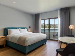 Voodi või voodid majutusasutuse Acqua Hotel toas