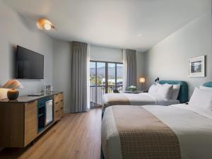 Voodi või voodid majutusasutuse Acqua Hotel toas