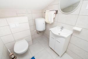 Koupelna v ubytování Apartments Marija