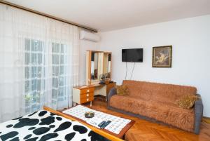TV a/nebo společenská místnost v ubytování Apartments Marija