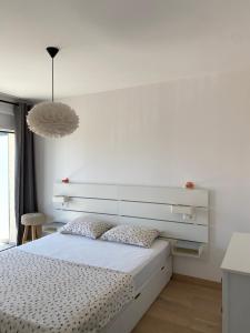 Postel nebo postele na pokoji v ubytování Apartments Bogic