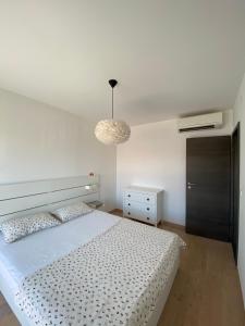 Postel nebo postele na pokoji v ubytování Apartments Bogic